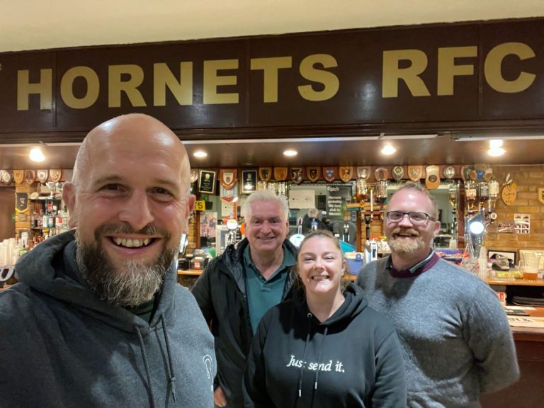 Rhi Tottle, Stu Simmons and Rich Powell with Tim Tunnicliff at Hornets RFC